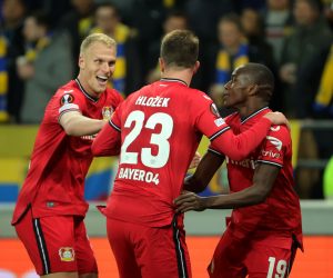 epa10582738 Adam Hlozek of Leverkusen (R2) celebrates with teammates Mitchel Bakker (L) and Moussa Diaby (R) after scoring the 1-4 during the UEFA Europa League quarter final, 2nd leg match between Union Saint-Gilloise and Bayer Leverkusen in Brussels, Belgium, 20 April 2023.  EPA/OLIVIER MATTHYS