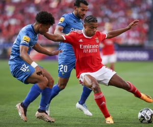 epa10588113 Benfica player David Neres (R) in action against Estoril Praia player Joao Carvalho during the Portuguese First League soccer match between SL Benfica and Estoril Praia in Lisbon, Portugal, 23 April 2023.  EPA/JOSÉ SENA GOULÃO