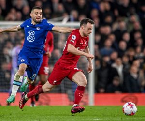 epa10558804 Mateo Kovacic of Chelsea (L) in action against Konstantinos Tsimikas of Liverpool (R) during the English Premier League soccer match between Chelsea FC and Liverpool FC in London, Britain, 04 April 2023.  EPA/ANDY RAIN EDITORIAL USE ONLY. No use with unauthorized audio, video, data, fixture lists, club/league logos or 'live' services. Online in-match use limited to 120 images, no video emulation. No use in betting, games or single club/league/player publications