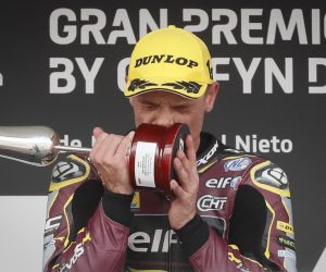 epa10599876 British rider Sam Lowes (Kalex) celebrates his victory on the podium following the Spanish Moto2 Grand Prix at Angel Nieto circuit in Jerez de la Frontera, southern Spain, 30 April 2023.  EPA/Jose Manuel Vidal