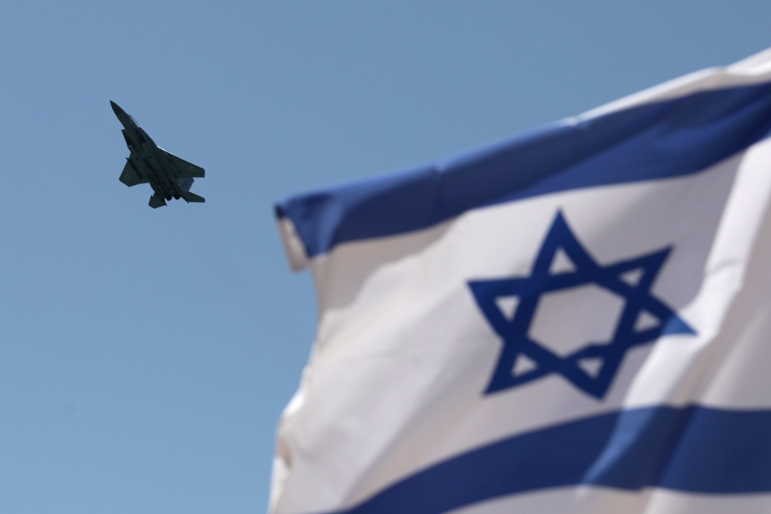 epa10588945 An F15 fighter jet of the Israeli Air Force performs during a rehearsal air show above the beaches of Tel Aviv ahead of Independence Day, Israel, 24 April 2023. Israel will celebrate its 75th Independence Day on 26 April.  EPA/ABIR SULTAN