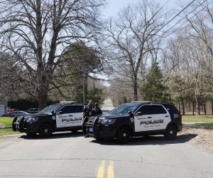 epa10571320 Members of the Dighton Police Department block a road on which the alleged suspect in a US intelligence leak lives in Dighton, Massachusetts, USA, 13 April 2023. US President Biden earlier in the day stated that investigators in the intelligence community and the Justice Department were closing in as part of an investigation in to the documents which were leaked online starting in March 2023.  EPA/CJ GUNTHER