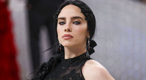Billie Eilish poses at the Met Gala, an annual fundraising gala held for the benefit of the Metropolitan Museum of Art's Costume Institute with this year's theme "Karl Lagerfeld: A Line of Beauty", in New York City, New York, U.S., May 1, 2023. REUTERS/Andrew Kelly