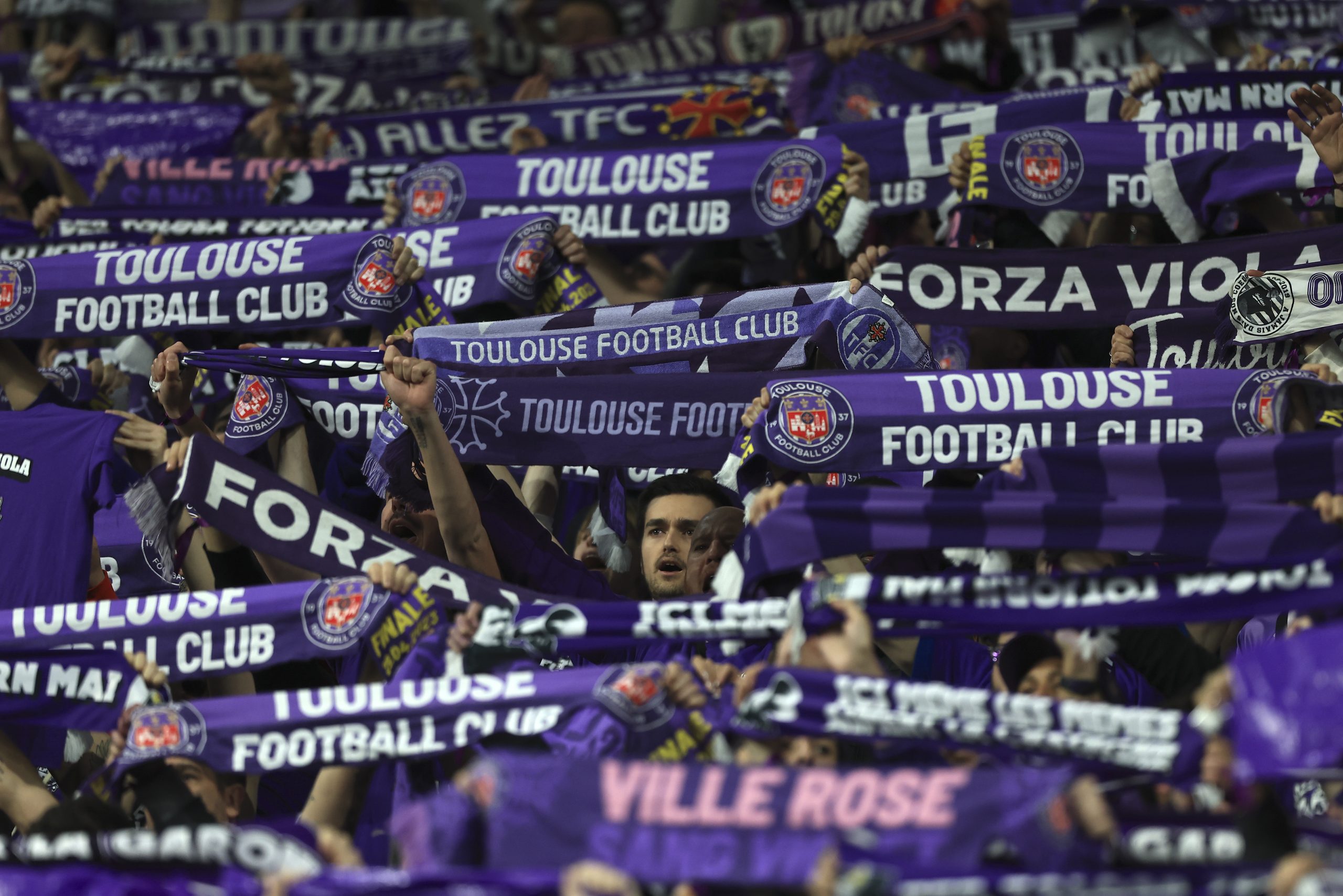 Toulouse supporters react during the French Cup final soccer match between Nantes and Toulouse, at the Stade de France in Saint-Denis, outside Paris, Saturday, April 29, 2023. (AP Photo/Aurelien Morissard)