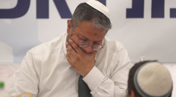 epa10567422 Israeli Minister of Internal Security Itamar Ben Gvir attending a far-right  rally near the illegal outpost of Avitar, near the West Bank city of Nablus, 10 April 2023. The rally aimed to legitimize the outpost of Avitar, built on land of the village of Beta near Nablus.  EPA/ATEF SAFADI
