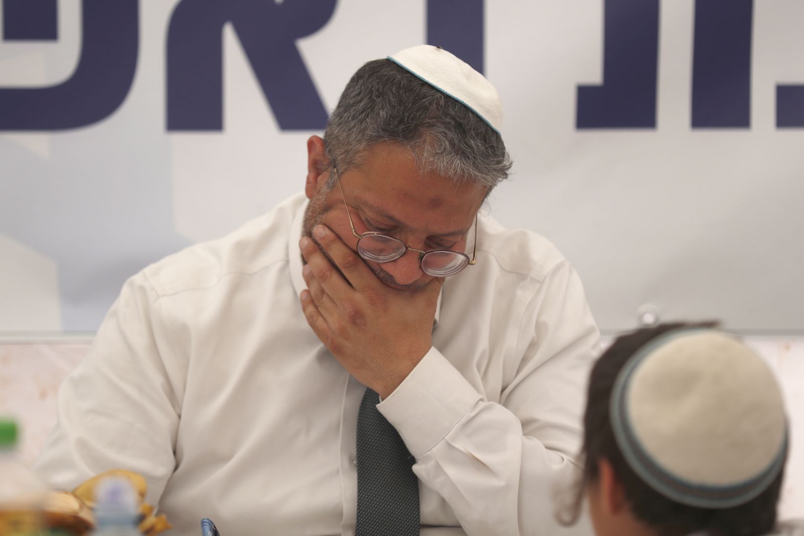 epa10567422 Israeli Minister of Internal Security Itamar Ben Gvir attending a far-right  rally near the illegal outpost of Avitar, near the West Bank city of Nablus, 10 April 2023. The rally aimed to legitimize the outpost of Avitar, built on land of the village of Beta near Nablus.  EPA/ATEF SAFADI