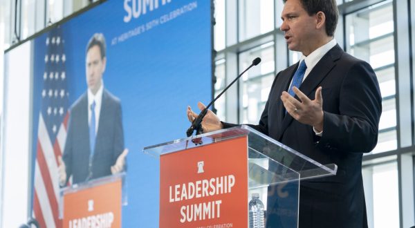 epa10584326 Florida Governor and 2024 Republican candidate for US President Ron DeSantis delivers the keynote address at The Heritage Foundations 50th Anniversary Leadership Summit at National Harbor, Maryland, USA, 21 April 2023. A new Wall Street Journal poll finds former President Donald Trump has gained command of the GOP presidential-nomination race over Ron DeSantis.  EPA/SHAWN THEW