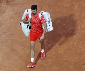 epa10571259 Novak Djokovic of Serbia reacts after losing his third round match against Lorenzo Musetti of Italy at the Monte-Carlo Rolex Masters tournament in Roquebrune Cap Martin, France, 13 April 2023.  EPA/SEBASTIEN NOGIER