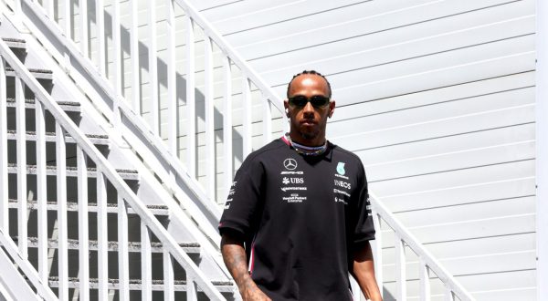 epa10594353 British Formula One driver Lewis Hamilton of Mercedes-AMG Petronas in the paddock at the Baku City Circuit in Baku Azerbaijan, 27 April 2023. The Formula One Grand Prix of Azerbaijan will take place on 30 April 2023.  EPA/ALI HAIDER