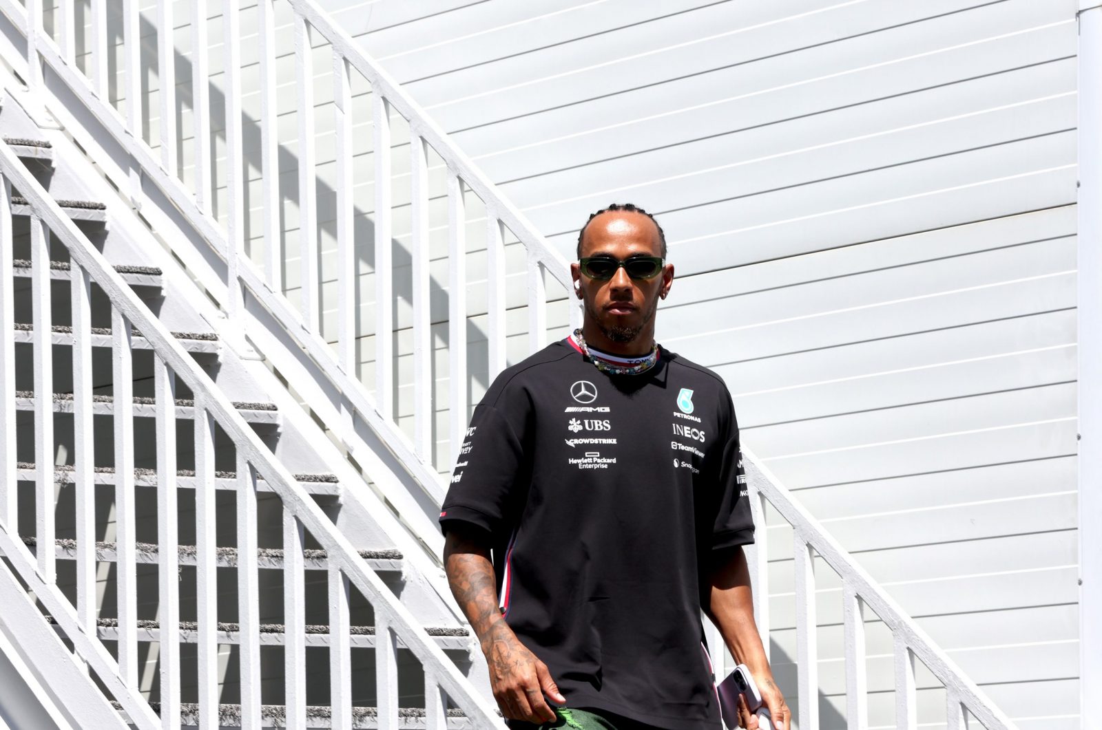 epa10594353 British Formula One driver Lewis Hamilton of Mercedes-AMG Petronas in the paddock at the Baku City Circuit in Baku Azerbaijan, 27 April 2023. The Formula One Grand Prix of Azerbaijan will take place on 30 April 2023.  EPA/ALI HAIDER