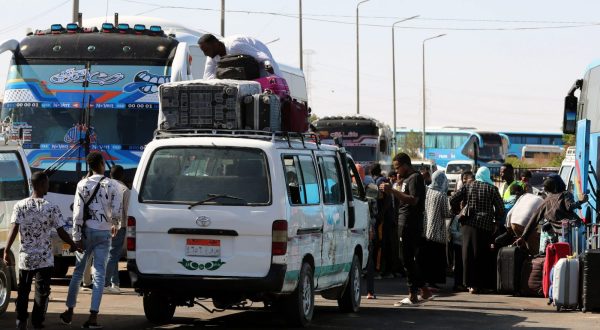 epa10600762 People fleeing Sudan arrive at Wadi Karkar bus station in Aswan, southern Egypt, 30 April 2023. According to UNHCR thousands of people have fled Sudan since mid-April after heavily armed clashes between Sudan's military and rival paramilitary groups started in the capital Khartoum and other parts of the country on 15 April 2023.  EPA/KHALED ELFIQI