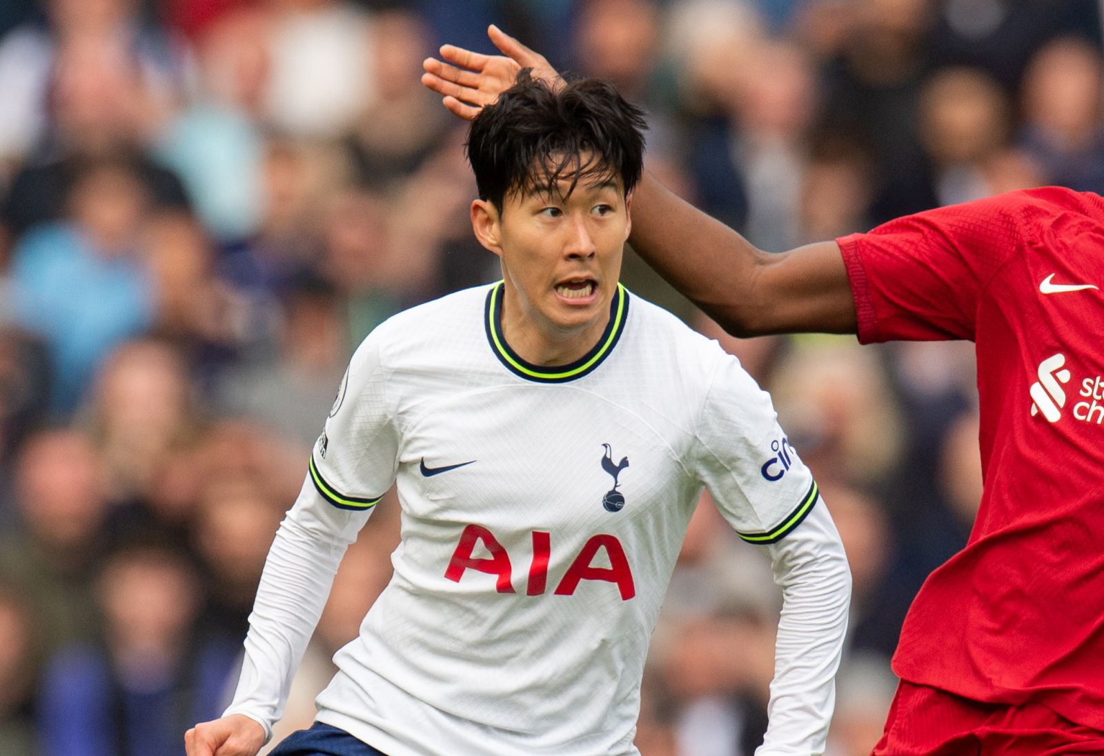 epa10600733 Tottenham Hotspur's Son Heung-Min (L) in action with Liverpool's Ibrahima Konate (R) during the English Premier League soccer match between Liverpool and Tottenham Hotspur, in Liverpool, Britain, 30 April 2023.  EPA/Peter Powell EDITORIAL USE ONLY. No use with unauthorized audio, video, data, fixture lists, club/league logos or 'live' services. Online in-match use limited to 120 images, no video emulation. No use in betting, games or single club/league/player publications