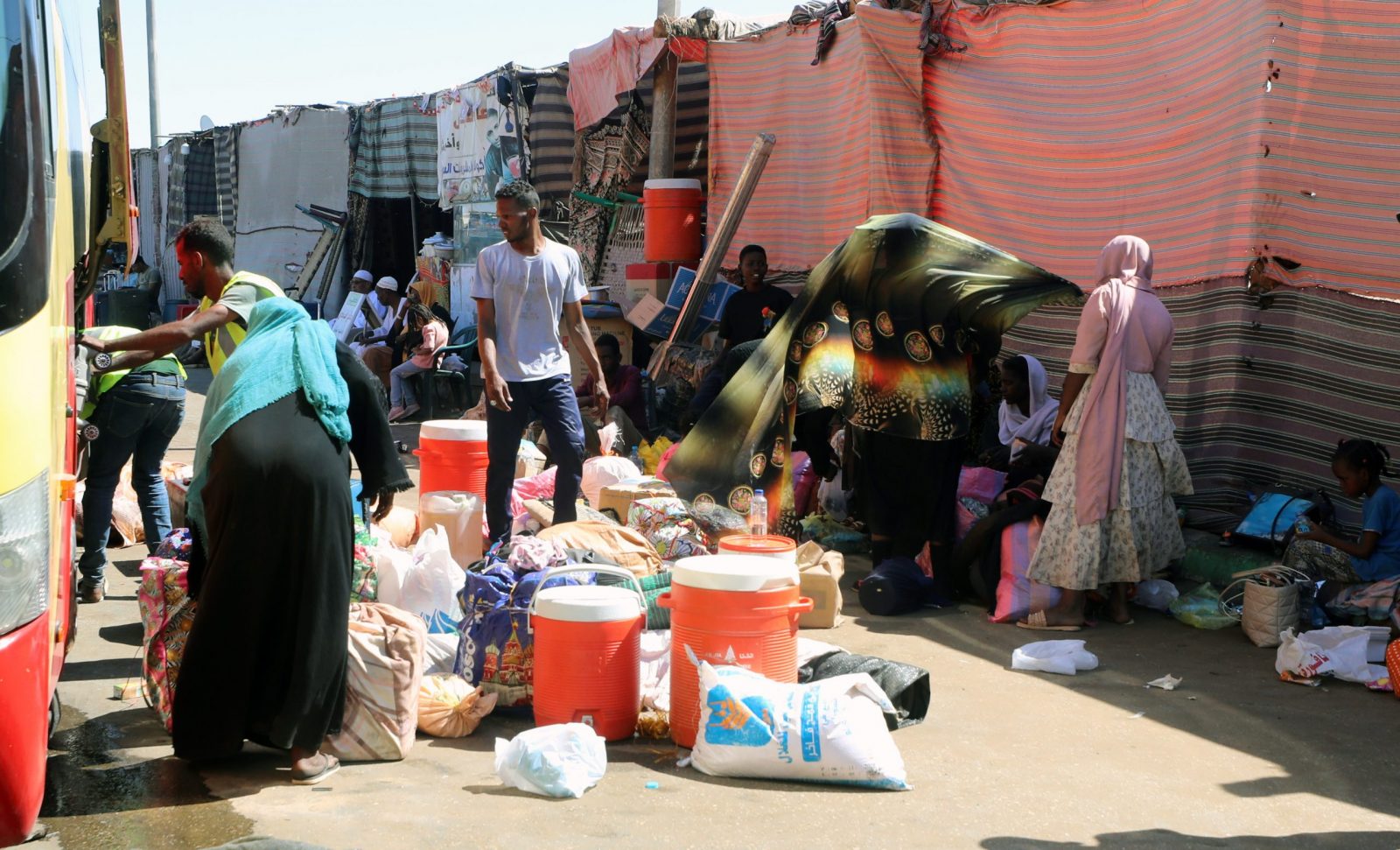 epa10606562 People who fled the fighting in Sudan arrive at Wadi Karkar bus station in Aswan, Egypt, 03 May 2023. Egypt's Foreign Ministry said on 27 April that more than 16,000 people fleeing the fighting in Sudan had crossed into Egypt, including over 14,000 Sudanese nationals. The ministry also said 6,960 Egyptian nationals were evacuated from Sudan till 30 April. Heavy armed clashes between Sudan's military and rival paramilitary groups have occurred in the capital Khartoum and other parts of the country since 15 April 2023.  EPA/KHALED ELFIQI