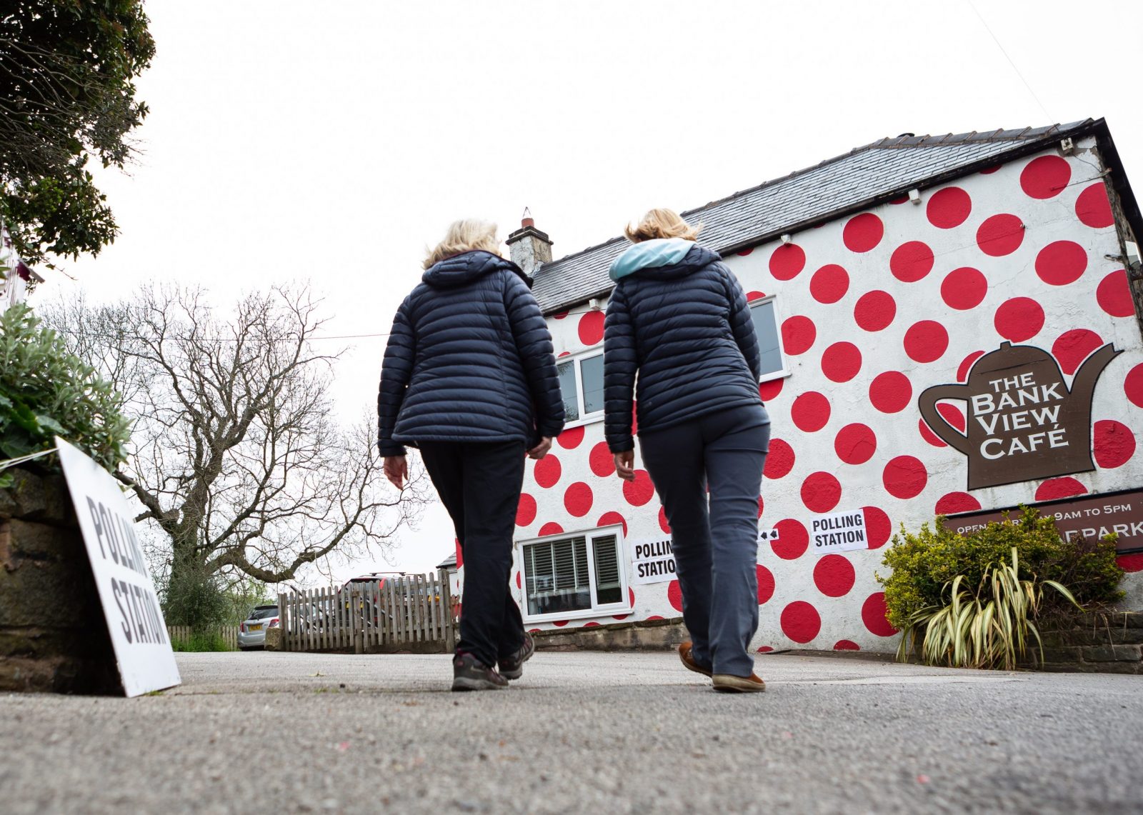 epa10607904 People arrive at a polling station at Langsett Barn in Sheffield, Britain, 04 May 2023. Local elections are being held in England on 04 May 2023, with over 8,000 seats being contested across 230 councils and Mayoral elections taking place in Bedford, Leicester, Mansfield and Middlesbrough.  EPA/ADAM VAUGHAN