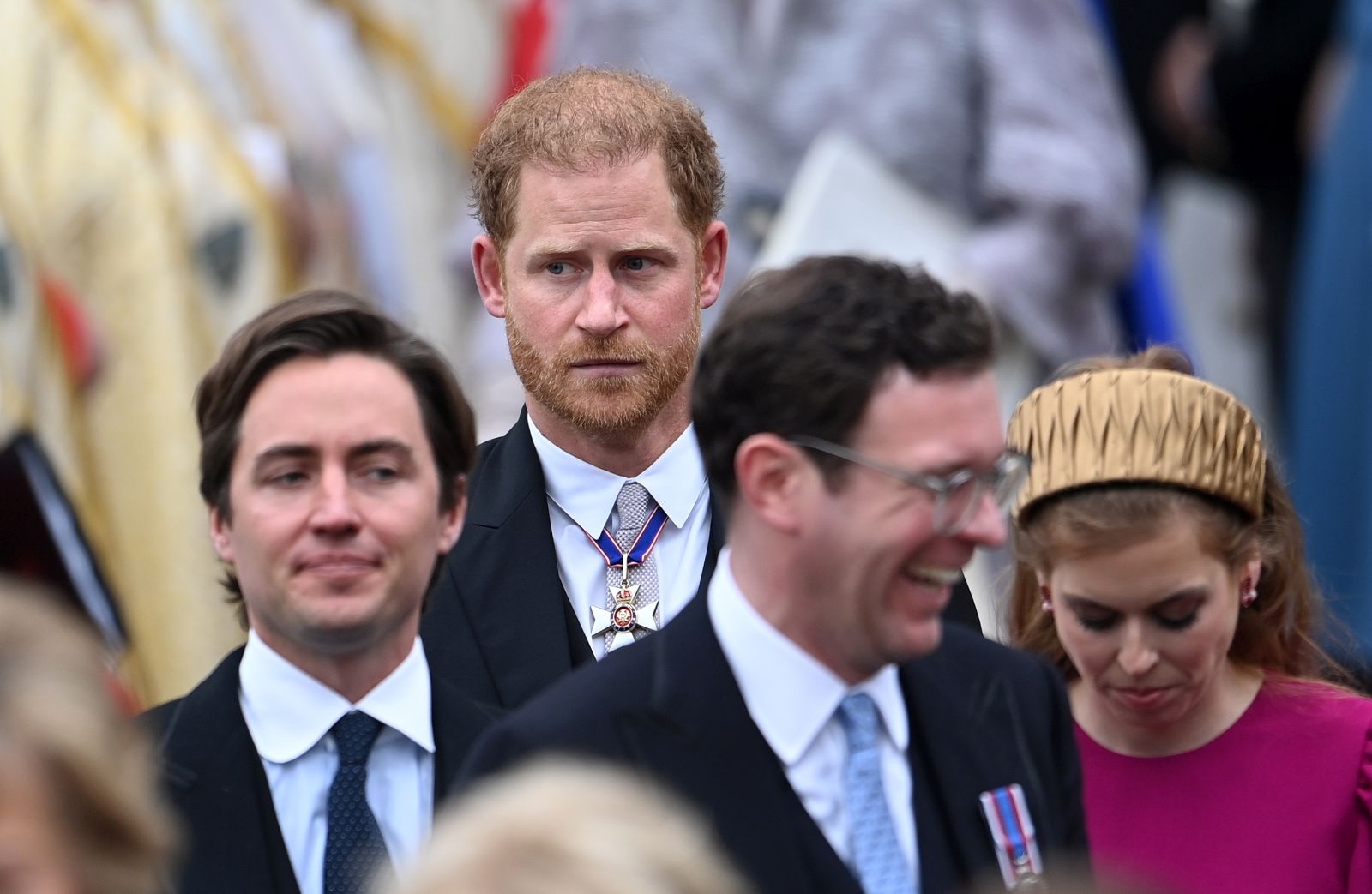 epa10611947 Princess Beatrice (R), daughter of Britain's Prince Andrew, with her husband Edoardo Mapelli Mozzi (L) and Britain's Prince Harry (2-L), the Duke of Sussex, depart after the Coronation of Britain's King Charles III and Queen Camilla at Westminster Abbey, London, Britain, 06 May 2023. Coronations of British Kings and Queens have taken place at Westminster Abbey for the last 900 years. The service was attended by around 100 heads of state from around the world.  EPA/Andy Rain
