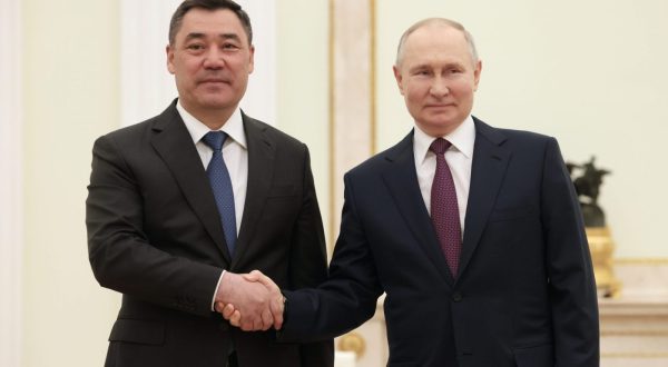 epa10615338 Russian President Vladimir Putin (R) shakes hands with Kyrgyz President Sadyr Japarov during their meeting at the Moscow Kremlin in Moscow, Russia 08 May 2023. The leaders of the countries of the former USSR - Kazakhstan, Kyrgyzstan, Armenia and Tajikistan will take part in the events on 09 May dedicated to Victory Day in Moscow.  EPA/SPUTNIK/ KREMLIN POOL MANDATORY CREDIT