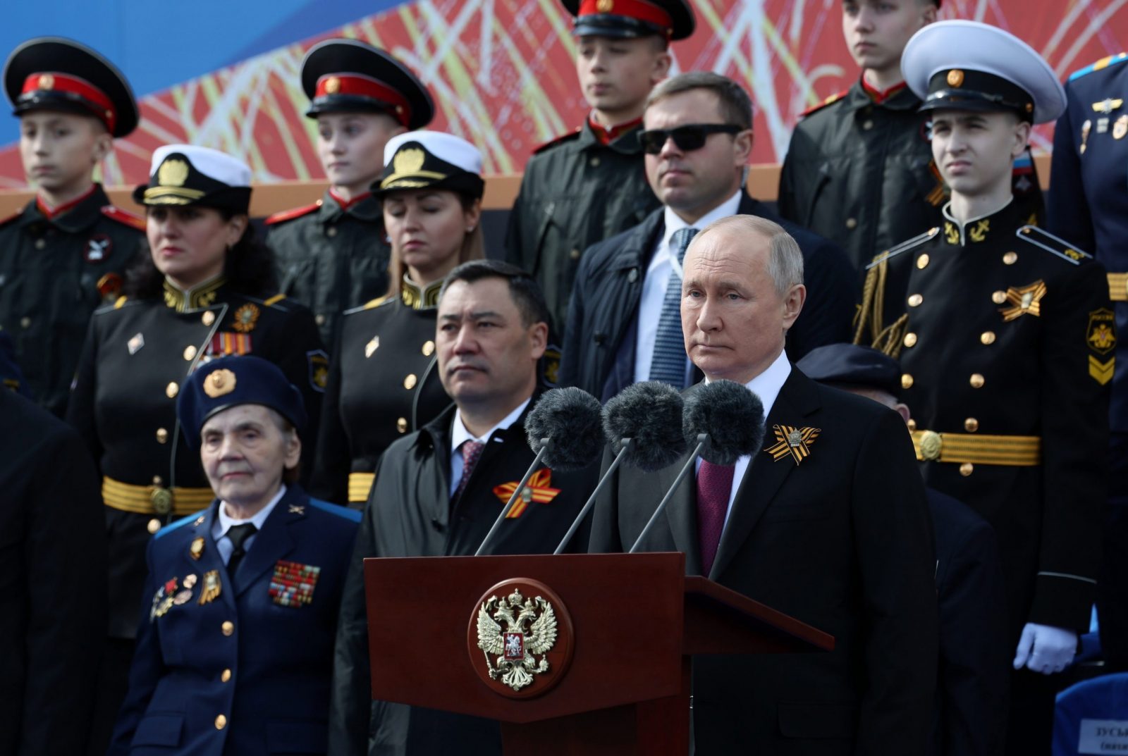 epa10616636 Russian President Vladimir Putin (C) delivers his speech during a Victory Day military parade on Red Square in Moscow, Russia, 09 May 2023. Russia marks the 78th anniversary of the victory in World War II over Nazi Germany and its allies. The Soviet Union lost 27 million people in the war.  EPA/GAVRIIL GRIGOROV / SPUTNIK / KREMLIN POOL