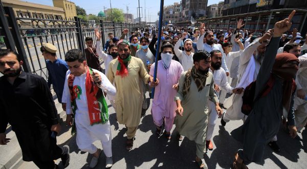epa10618841 Supporters of Pakistan's former Prime Minister Imran Khan rally following the arrest of the head of the opposition party Pakistan Tehrik-e-Insaf, in Peshawar, Pakistan, 10 May 2023. At least four people died and dozens more were injured on 09 May in disturbances across Pakistan following the arrest of former prime minister Khan, spokespeople for his PTI party said. The government shut down Twitter, Facebook, and YouTube in much of the country, blocking both the internet and mobile data. Authorities suspended the right of assembly in the capital Islamabad and throughout Khan's native province of Punjab. Pakistan Rangers, a paramilitary law enforcement corps, on 09 May apprehended former Prime Minister, Imran Khan, while he was attending a bail hearing in court in Islamabad. Khan, who had been ousted from his position as prime minister by parliament in a vote of no-confidence, is currently facing multiple charges of corruption and terrorism.  EPA/BILAWAL ARBAB