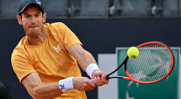 epa10619619 Andy Murray of Britain in action during his men's singles first round match against Fabio Fognini of Italy (not pictured) at the Italian Open tennis tournament in Rome, Italy, 10 May 2023.  EPA/ETTORE FERRARI