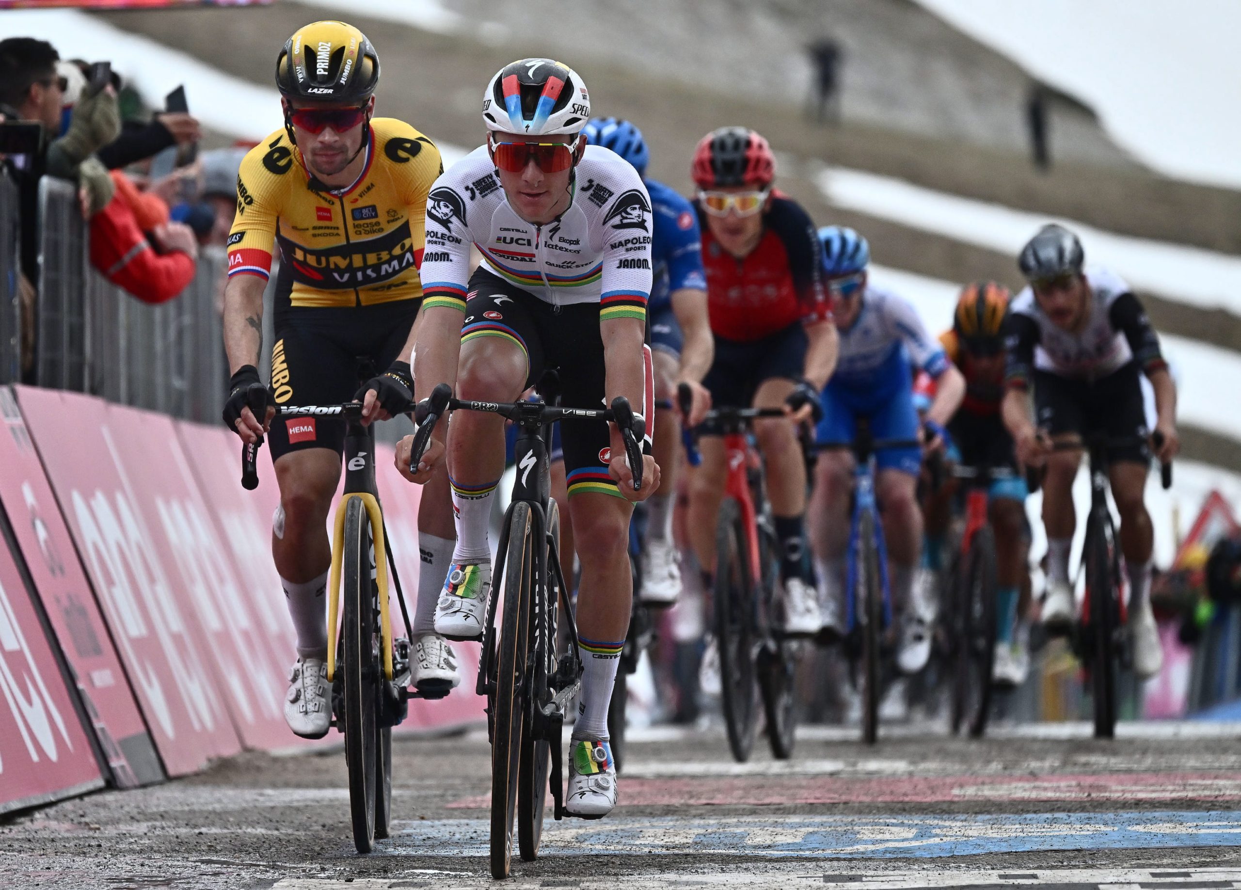 epa10623369 Slovenian rider  Primoz Roglic (L) of team Jumbo Visma and Belgian rider Remco Evenepoel of Soudal Quick-Step team in action during the seventh stage of the 2023 Giro d'Italia cycling race, over 218 km from Capua to Gran Sasso d'Italia, Italy, 12 May 2023.  EPA/LUCA ZENNARO