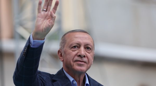 epa10625026 Turkish President Recep Tayyip Erdogan greets his supporters during his election campaign rally at Beyoglu district in Istanbul, Turkey, 13 May 2023. Turkey will hold its general election on 14 May 2023 with a two-round system to elect its president, while parliamentary elections will be held simultaneously.  EPA/TOLGA BOZOGLU