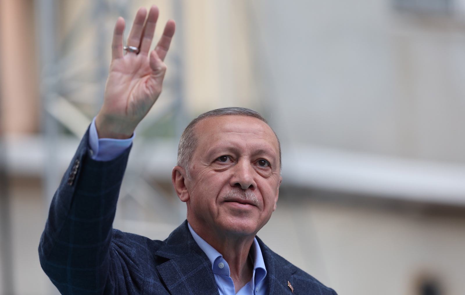 epa10625026 Turkish President Recep Tayyip Erdogan greets his supporters during his election campaign rally at Beyoglu district in Istanbul, Turkey, 13 May 2023. Turkey will hold its general election on 14 May 2023 with a two-round system to elect its president, while parliamentary elections will be held simultaneously.  EPA/TOLGA BOZOGLU