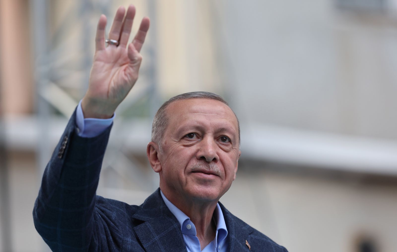 epa10625026 Turkish President Recep Tayyip Erdogan greets his supporters during his election campaign rally at Beyoglu district in Istanbul, Turkey, 13 May 2023. Turkey will hold its general election on 14 May 2023 with a two-round system to elect its president, while parliamentary elections will be held simultaneously.  EPA/TOLGA BOZOGLU