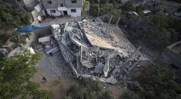epa10625716 The destroyed house of the Nabhan family following an Israeli air strike in Beit Lahiya town in northern Gaza Strip, 13 May 2023. Ten members of the Nbhan family are disabled. Israel carried out several attacks against the military leadership of the Islamic Jihad movement in the Gaza Strip since 09 May 2023. Fighting continues between Israel and the militants of the Al-Quds Brigades, the armed wing of the Palestinian Islamic Jihad, in Gaza Strip.  EPA/HAITHAM IMAD