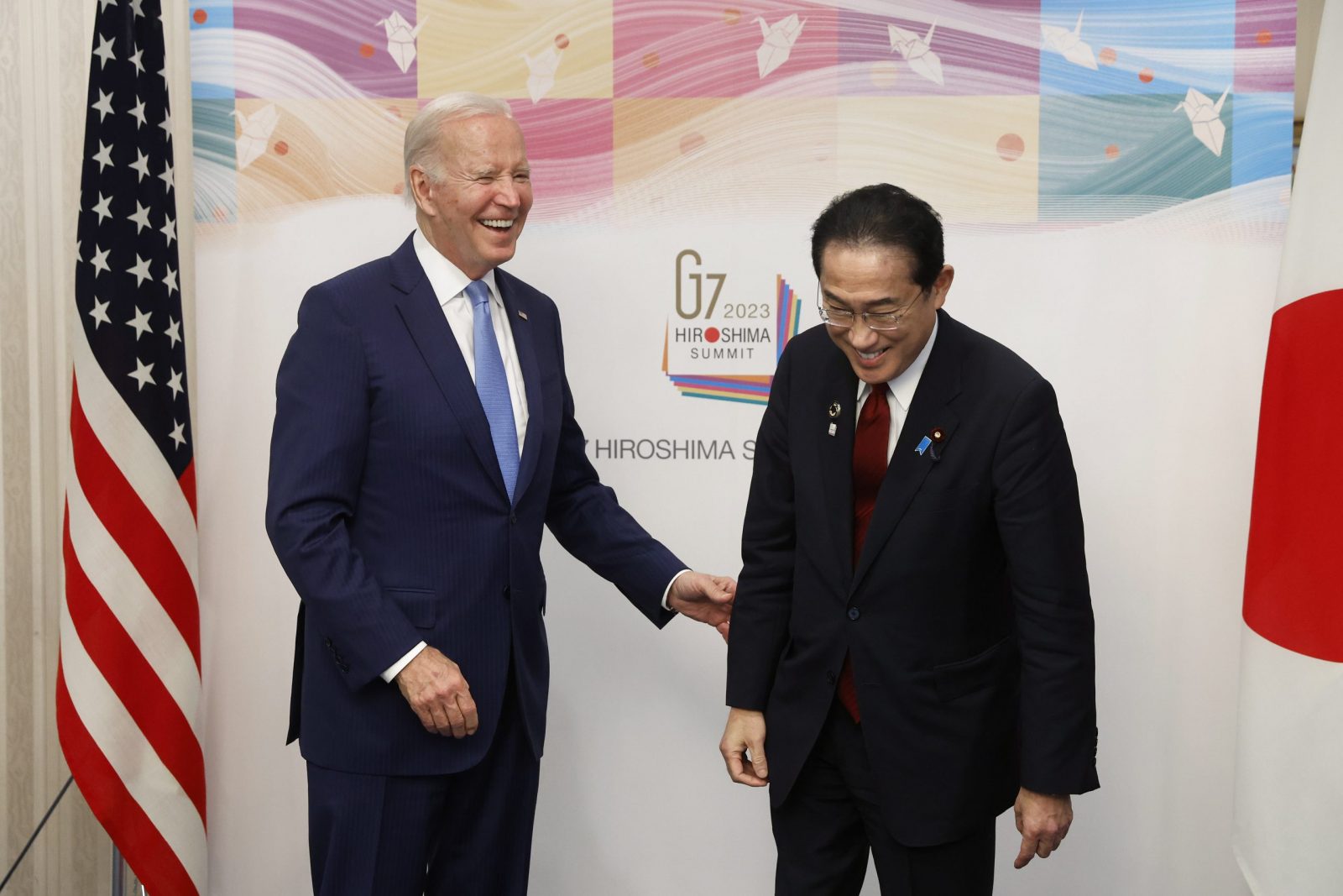 epa10635956 US President Joe Biden (L) and Japan's prime Minister Fumio Kishida (R) react prior to a bilateral meeting ahead of the G7 Hiroshima Summit in Hiroshima, Japan, 18 May 2023. The G7 Hiroshima Summit will be held from 19 to 21 May 2023.  EPA/Kiyoshi Ota / POOL