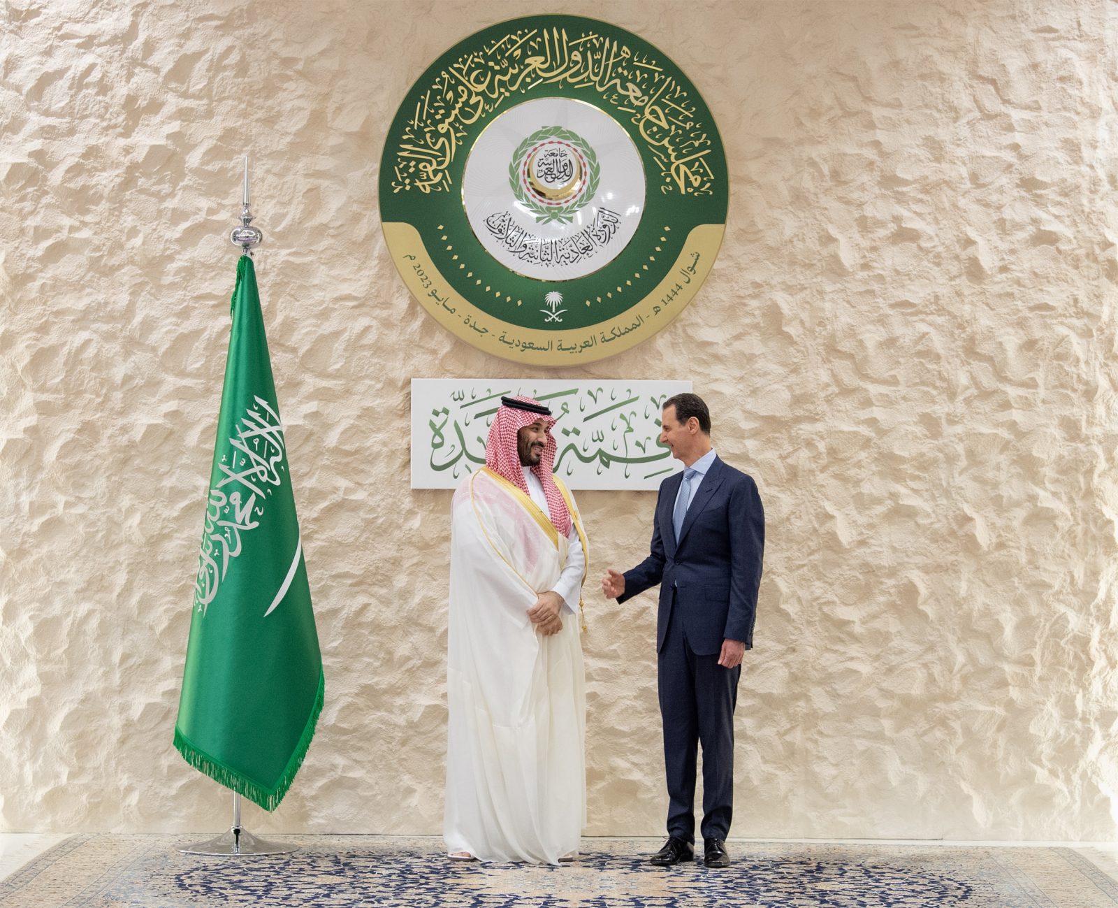epa10638829 A handout photo made available by Saudi Royal Palace shows Saudi Crown Prince Mohammed bin Salman (L) receiving Syrian President Bashar al-Assad prior the 32nd Arab League summit, in Jeddah, Saudi Arabia, 19 May 2023.  EPA/BANDAR ALJALOUD / HANDOUT  HANDOUT EDITORIAL USE ONLY/NO SALES