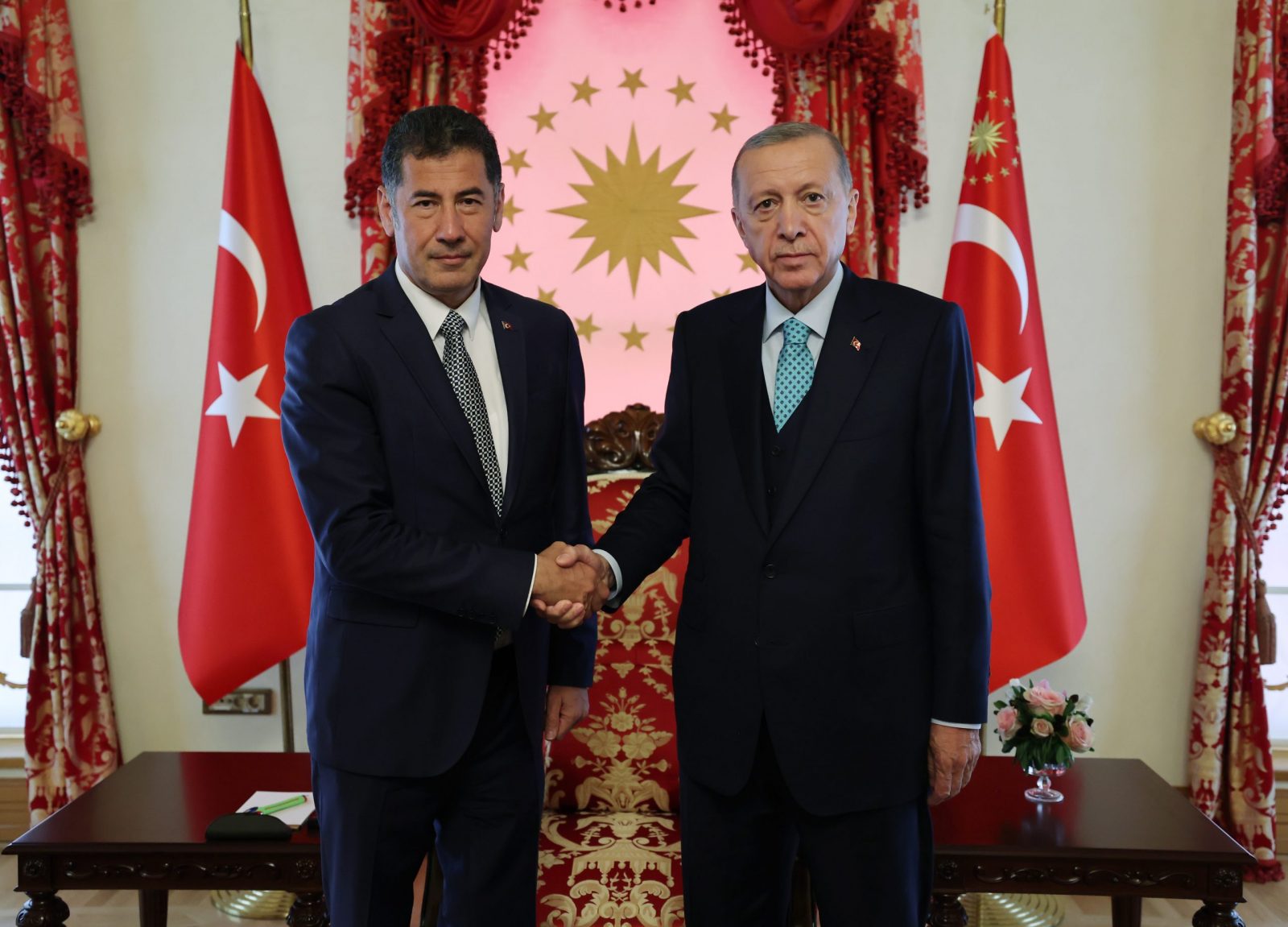 epa10639004 A handout photo made available by the Turkish President Press Office shows,  Turkish President Recep Tayyip Erdogan (R) shaking hands with former presidential candidate of the ATA Alliance, Sinan Ogan (L)  in Istanbul, Turkey, 19 May 2023. Ogan finished third in the first round of the presidential election. The second round of presidential election between Turkish President Erdogan and challenger Kilicdaroglu will be held on 28 May 2023.  EPA/PRESIDENT PRESS OFFICE HANDOUT  HANDOUT EDITORIAL USE ONLY/NO SALES