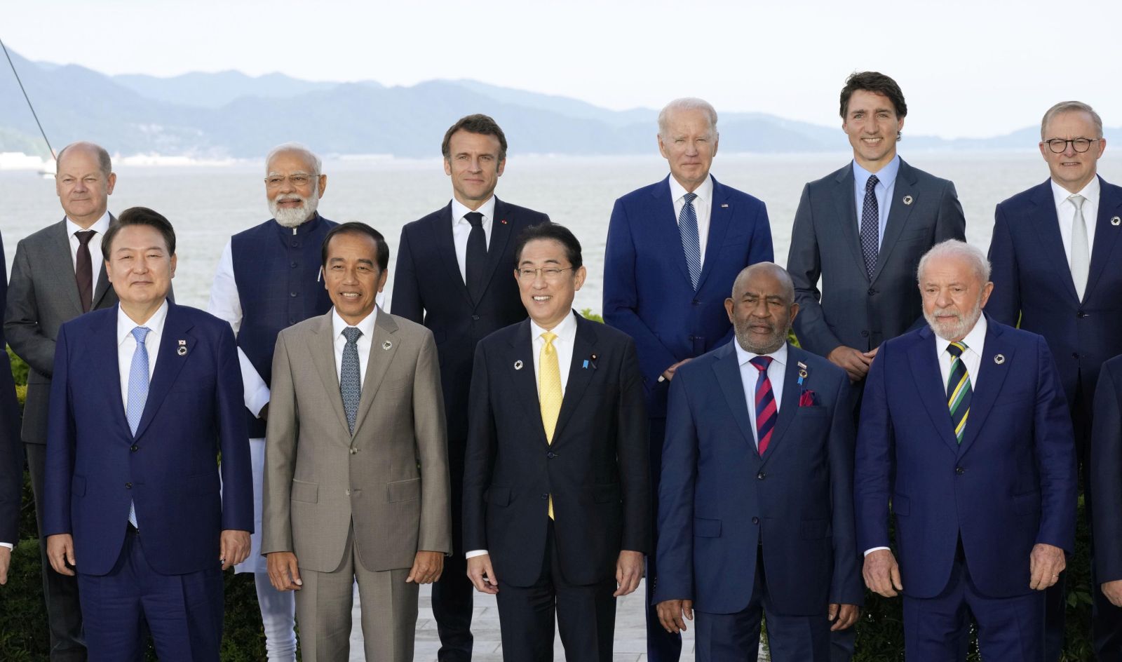 epa10640292 (Back L-R) German Chancellor Olaf Scholz, Indian Prime Minister Narendra Modi, French President Emmanuel Macron, US President Joe Biden, Canadian Prime Minister Justin Trudeau, Australian Prime Minister Anthony Albanese, (front L-R) South Korea's President Yoon Suk-yeol, Indonesia's President Joko Widodo, Japan’s Prime Minister Fumio Kishida, President of the Comoros Azali Assoumani and Brazil's President Luiz Inacio Lula da Silva pose for a group photo at the Grand Prince Hotel Hiroshima during the G7 Hiroshima Summit in Hiroshima, Japan, 20 May 2023. The G7 Hiroshima Summit began 19 May and will conclude 21 May.  EPA/JAPAN POOL JAPAN OUT, EDITORIAL USE ONLY, NO SALES