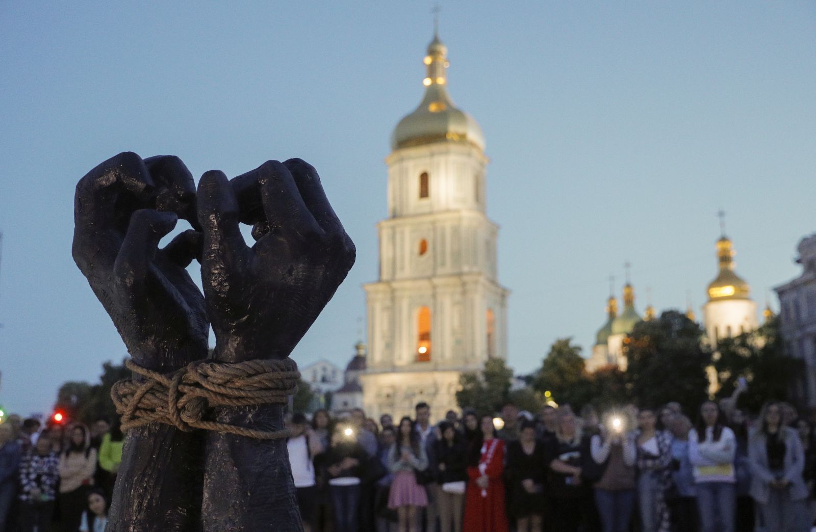 epa10641889 Ukrainians attend the opening of an installation symbolising the resilience and faith of prisoners of war from Azovstal, to mark one year since the withdrawal of Ukrainian troops from the Azovstal steel plant in Mariupol, in downtown Kyiv, Ukraine, 20 May 2023, amid the Russian invasion. As organizers informed, the installation is planned to remain at the site until the last prisoner of war from Azovstal will be released. Ukrainian fighters of Mariupol's Azovstal steel works, who spent months defending the steel plant, surrendered in May 2022 after command decision. Mariupol had seen a long battle for its control between Ukrainian and Russian forces as well as a siege, with hostilities lasting from February to the end of May 2022. Russian troops entered Ukrainian territory on 24 February 2022, starting a conflict that has provoked destruction and a humanitarian crisis.  EPA/SERGEY DOLZHENKO
