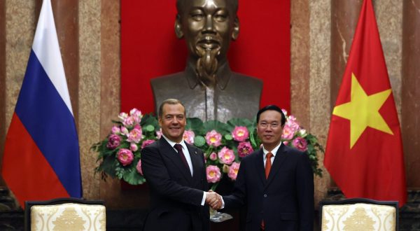 epa10645796 Deputy chairman of Russia's Security Council Dmitry Medvedev (L) and Vietnam's president Vo Van Thuong shake hands during their meeting, in Hanoi, Vietnam, 22 May 2023. Dmitry Medvedev arrived in Vietnam on a two-day working visit, he will hold talks with the country's leadership. Since December 2022, Dmitry Medvedev has been First Deputy President of the Military Industrial Commission. The commission organizes and coordinates the activities of federal departments on issues of state policy in the field of the military-industrial complex.  EPA/EKATERINA SHTUKINA / SPUTNIK / GOVERNMENT PRESS SERVICE POOL MANDATORY CREDIT