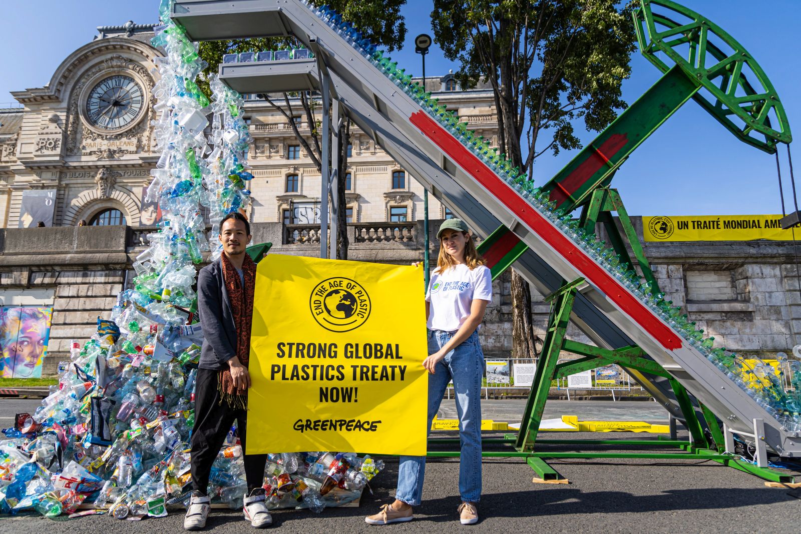 epa10657065 US actor Shailene Woodley (R) poses with Canadian artist and activist Benjamin Von Wong (L)  next to an art installation called ‘Perpetual Plastic Machine’ during an event organised by environmental organisation Greenpeace in Paris, France, 27 May 2023. The Global Plastics Treaty (INC2), will be held in Paris at Unesco headquarters with over a thousand delegates, including ministers and governments, the UN having set a goal for the treaty to be negotiated by the end of 2024.  EPA/CHRISTOPHE PETIT TESSON