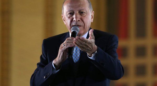 epa10661321 Turkish President Recep Tayyip Erdogan addresses supporters after winning re-election in Turkey's run-off vote, at the Presidential Palace in Ankara, Turkey, 28 May 2023. Erdogan won Turkey's presidential run-off and has been re-elected President, according to Turkey's Supreme Election Council.  EPA/NECATI SAVAS