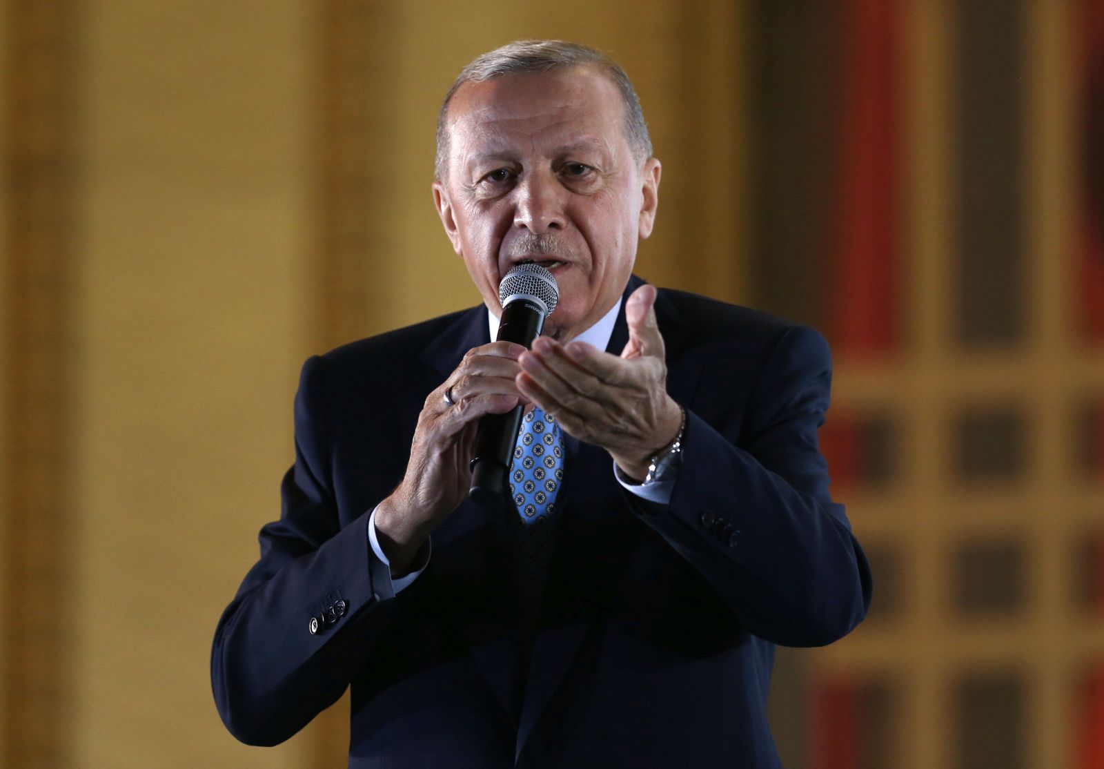 epa10661321 Turkish President Recep Tayyip Erdogan addresses supporters after winning re-election in Turkey's run-off vote, at the Presidential Palace in Ankara, Turkey, 28 May 2023. Erdogan won Turkey's presidential run-off and has been re-elected President, according to Turkey's Supreme Election Council.  EPA/NECATI SAVAS