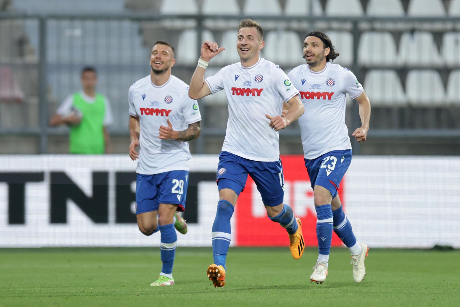 24.05.2023., stadion HNK Rijeka, Rijeka - Finalna utakmica SuperSport Hrvatskog nogometnog kupa, HNK Hajduk - HNK Sibenik. Nogometasi Hajduka slave pogodak Darija Melnjaka za 1:0. Jan Mlakar, Filip Krovinovic, Dario Melnjak Photo: Luka Stanzl/PIXSELL