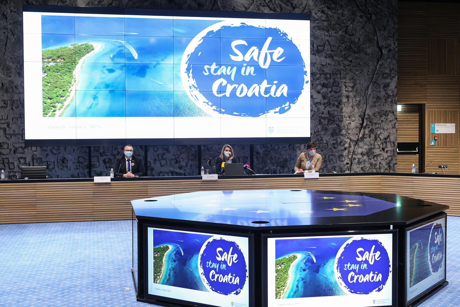 25.02.2021. Zagreb - Ministrica turizma i sporta Nikolina Brnjac i direktor Hrvatske turisticke zajednice Kristjan Stanicic predstavili su projekt "Safe stay in Croatia".  Oznake će, osim turističkih subjekata, moći koristiti i drugi u lancu putovanja, poput aviokompanija, benzinskih postaja, raznih turistickih sadrzaja, kulturnih i prirodnih atrakcija itd. Protokoli će biti uskladjeni s preporukama Hrvatskog zavoda za javno zdravstvo (HZJZ). Ukljucivat ce i naljepnicu s QR kodom koja se moze izloziti na vidljivom mjestu u objektu, a vodit ce i na posebnu internetsku stranicu  Photo:Zeljko Lukunic/PIXSELL