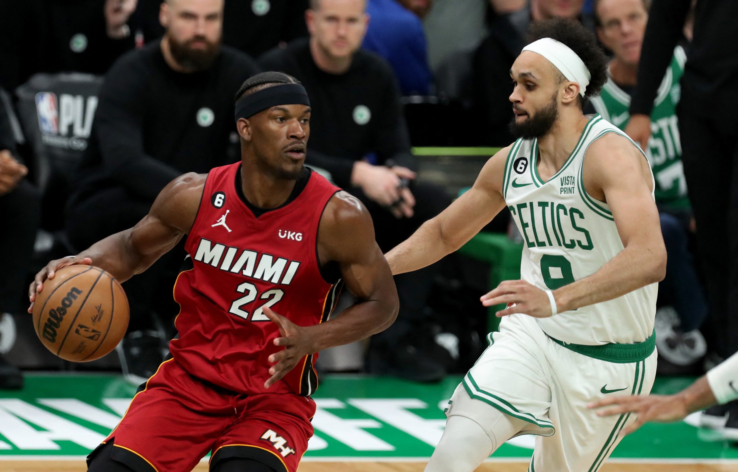 May 17, 2023; Boston, Massachusetts, USA; Miami Heat forward Jimmy Butler (22) dribbles against Boston Celtics guard Derrick White (9) during the second half in game one of the Eastern Conference Finals for the 2023 NBA playoffs at TD Garden. Mandatory Credit: Paul Rutherford-USA TODAY Sports Photo: Paul Rutherford/REUTERS