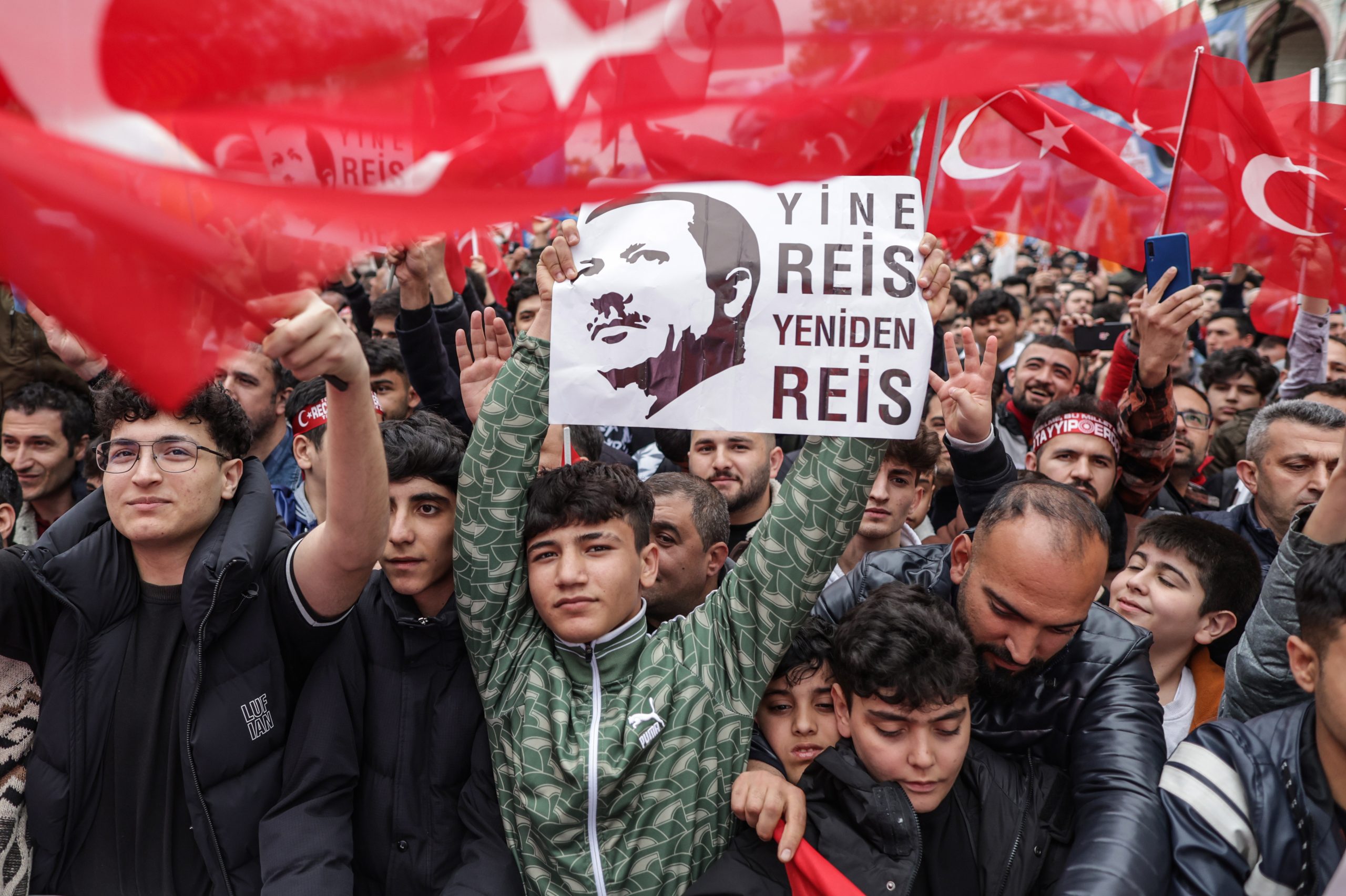 epa10622901 Supporters of Turkish President Recep Tayyip Erdogan attend his election campaign event in Istanbul, Turkey, 12 May 2023. Turkey will hold its general election on 14 May 2023 with a two-round system to elect its president, while parliamentary elections will be held simultaneously.  EPA/ERDEM SAHIN