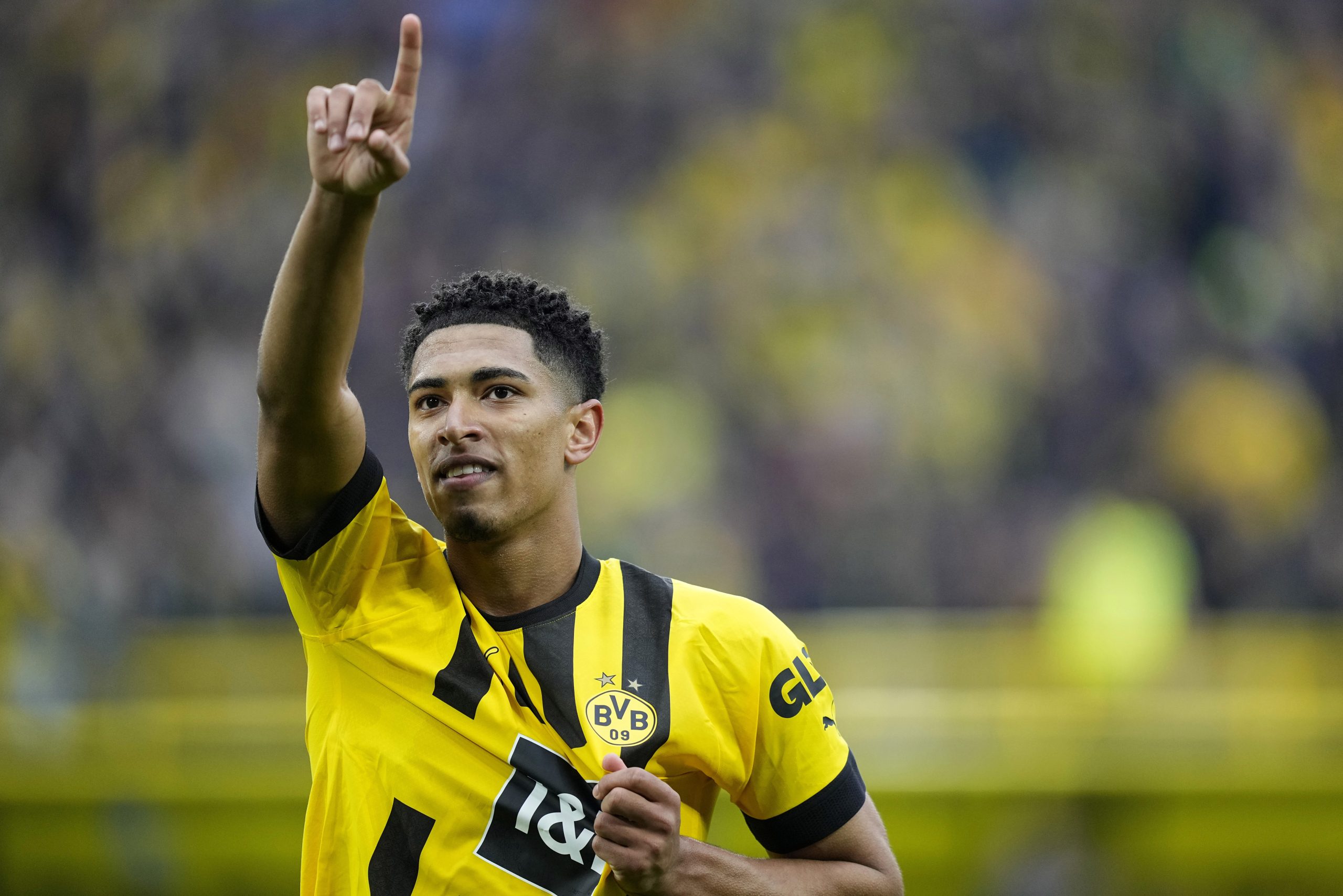 FILE - Dortmund's Jude Bellingham celebrates after scoring during the German Bundesliga soccer match between Borussia Dortmund and Eintracht Frankfurt in Dortmund, Germany, Saturday, April 22, 2023. Real Madrid has confirmed the signing of England midfielder Jude Bellingham from Borussia Dortmund. The Spanish club described Bellingham as one of the “biggest talents in world football.” Bellingham is 19 and has already established himself among the most sought-after players in soccer. Manchester United, Man City, Liverpool and Paris Saint-Germain were among his admirers. (AP Photo/Martin Meissner, File)