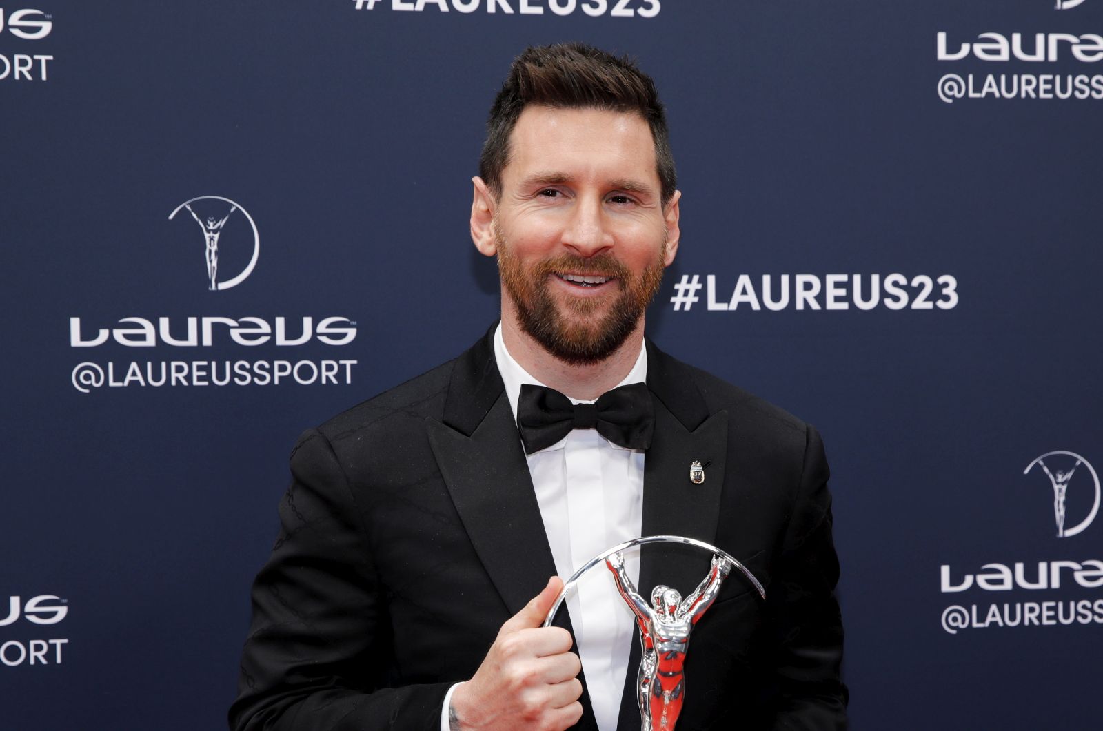 epa10615907 Argentinian soccer player Lionel Messi poses with Laureus World Sportsman of the Year award during the 2023 Laureus World Sports Awards in Paris, France, 08 May 2023. The awards ceremony will be an in-person event again after two years of virtual presentations due to the Covid-19 pandemic.  EPA/TERESA SUAREZ