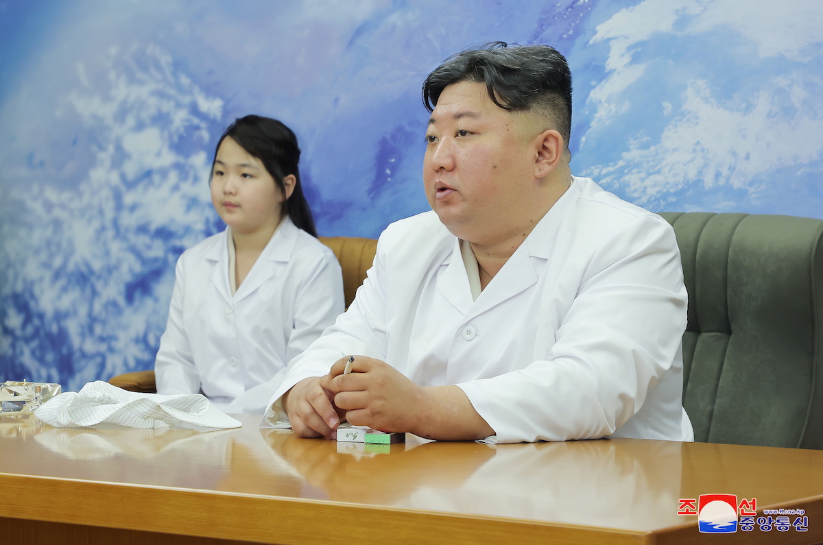 epa10633136 A photo released by the official North Korean Central News Agency (KCNA) shows Kim Jong Un (R), general secretary of the Workers' Party of Korea and president of the State Affairs of the Democratic People's Republic of Korea (DPRK), giving field guidance to the work of the Non-permanent Satellite Launch Preparatory Committee, while accompanied by his daughter Kim Ju-ae (L) at an undisclosed location in North Korea, 16 May 2023 (issued 17 May 2023). According to North Korean state media, the committee, which includes scientists from the nation's national defence research institutes as well as the DPRK Aerospace Development Administration, is currently working to launch military reconnaissance satellite No. 1.  EPA/KCNA   EDITORIAL USE ONLY