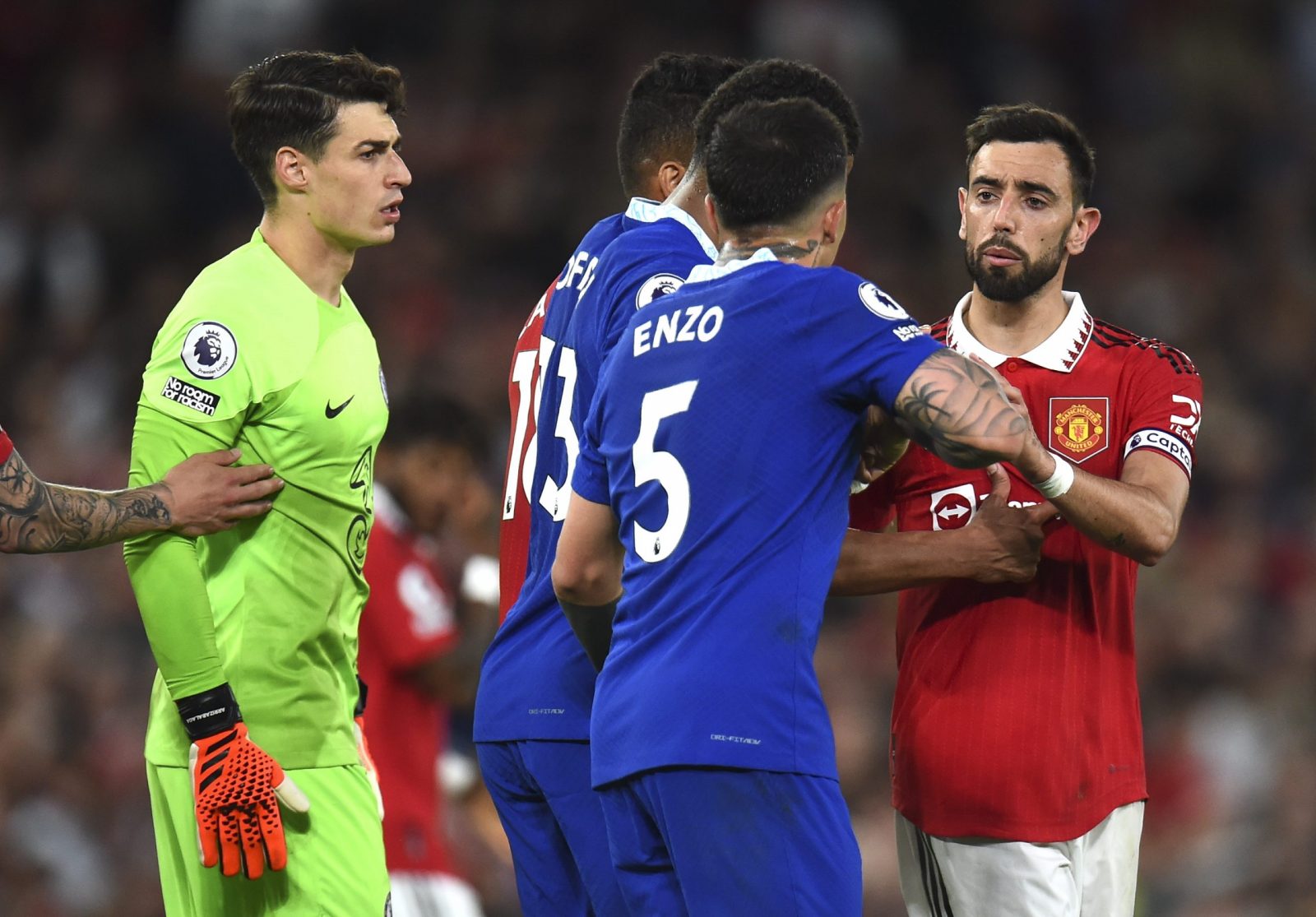epa10654317 Bruno Fernandesh (R) of Manchester United argues with players of Chelsea after scoring the 3-0 goal from the penalty spot during the English Premier League soccer match between Manchester United and Chelsea FC, in Manchester, Britain, 25 May 2023.  EPA/PETER POWELL EDITORIAL USE ONLY. No use with unauthorized audio, video, data, fixture lists, club/league logos or 'live' services. Online in-match use limited to 120 images, no video emulation. No use in betting, games or single club/league/player publications.