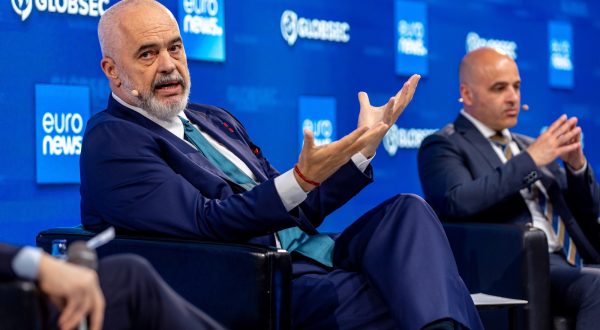 epa10664465 Prime Minister of the Republic of Albania Edi Rama (L) and North Macedonia's Prime Minister Dimitar Kovacevski (R) attend a session titled 'Open Roads: Balkans Back in Business' at GLOBSEC Security Forum in Bratislava, Slovakia, 31 May 2023.  EPA/MARTIN DIVISEK