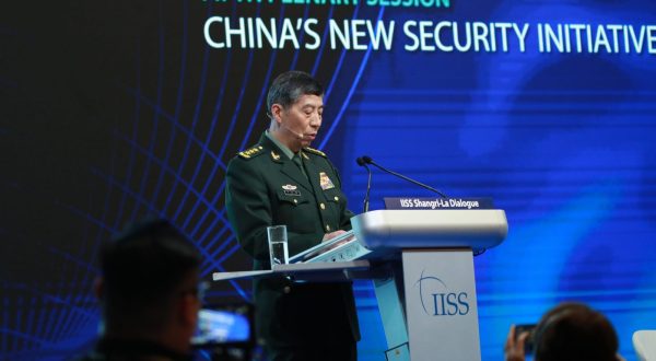 epa10671809 Chinese State Councilor and Minister of National Defence General Li Shangfu delivers his speech during a plenary session of the International Institute for Strategic Studies (IISS) Shangri-la Dialogue at the Shangri-la hotel in Singapore, 04 June 2023. Defense ministers and officials from 41 countries are gathered in the city state for the IISS Shangri-la Dialogue, an annual high level defence summit in the Asia Pacific region.  EPA/HOW HWEE YOUNG