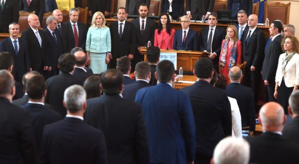 epa10675928 The new Prime Minister Nikolay Denkov (C) takes the oath at the Parliament in Sofia, Bulgaria, 06 June 2023. The two largest parties in Bulgaria, the conservative GERB and the reformist coalition 'Proceeding with the change - Democratic Bulgaria' (PP-BD), have agreed to govern together with a prime minister who will change every nine months, on a rotational formula, which should end two years of political deadlock in the European Union's (EU) poorest country. After the nine months, he will be replaced in the post by the candidate of GERB, the former European Commissioner Maria Gabriel.  EPA/VASSIL DONEV