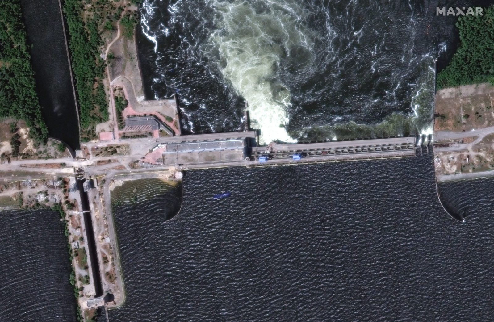 epa10676607 A handout satellite image made available by Maxar Technologies shows a closer view of the Nova Kakhovka dam and hydroelectric plant before its collapse Kherson region, southern Ukraine, 05 June 2023 (issued 06 June 2023). Ukraine has accused Russian forces of destroying a critical dam and hydroelectric power plant on the Dnipro River in the Kherson region along the front line in southern Ukraine on 06 June. A number of settlements were completely or partially flooded, Kherson region governor Oleksandr Prokudin said on telegram. Russian troops entered Ukraine on 24 February 2022 starting a conflict that has provoked destruction and a humanitarian crisis.  EPA/MAXAR TECHNOLOGIES HANDOUT -- MANDATORY CREDIT: SATELLITE IMAGE 2023 MAXAR TECHNOLOGIES -- THE WATERMARK MAY NOT BE REMOVED/CROPPED -- HANDOUT EDITORIAL USE ONLY/NO SALES