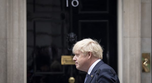 epa10682418 Former British Prime Minister Boris Johnson leaves after announcing his resignation as leader of the Conservative Party in Downing Street, London, Britain, 07 July 2022 (reissued on 09 June 2023). Boris Johnson announced on 09 June that he will be standing down from parliament with immediate effect, after the Privileges Committee investigation into the Partygate scandal recommended a suspension for his conduct..  EPA/TOLGA AKMEN